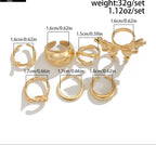 Set of gold rings with measurements and weight details on a white background